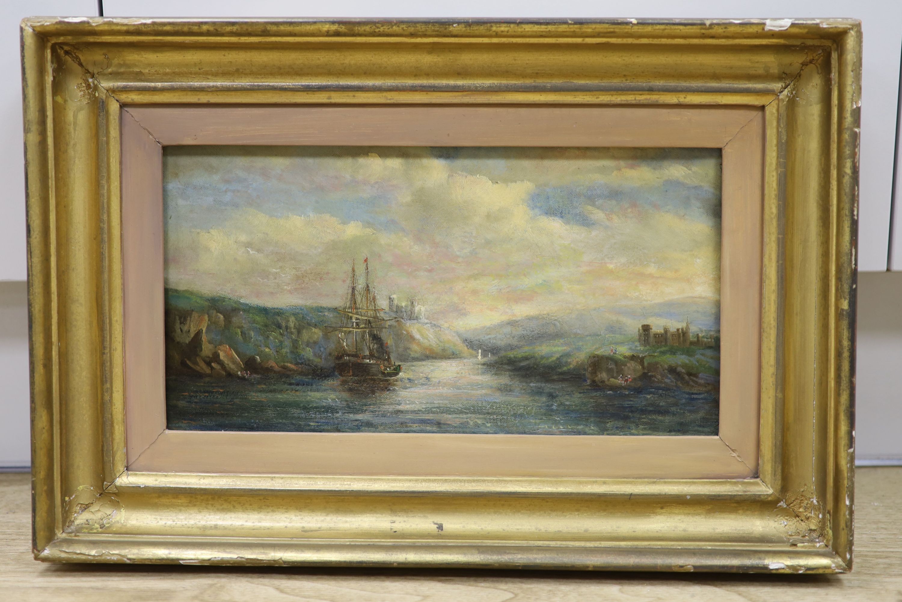 Late 19th century English School, oil on canvas, Estuary scene with ship and castles, 18 x 34cm